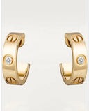Cartier kleine Ohrringe Gold Diamanten